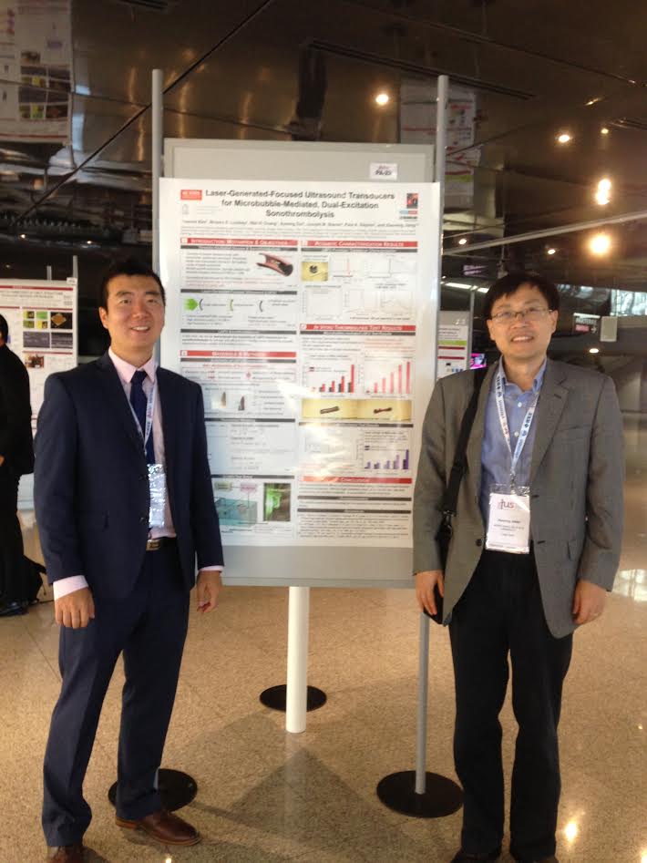 Jinwook and Dr. Jiang in front of their poster